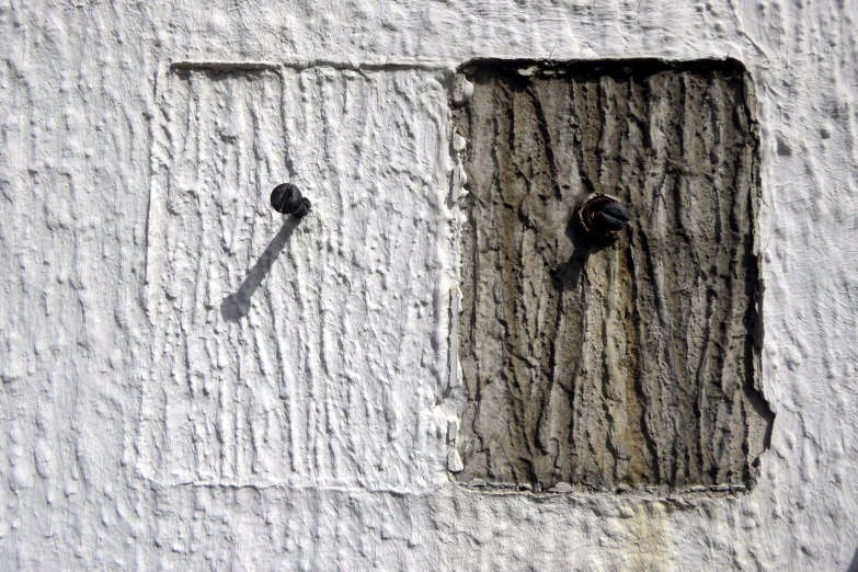 a building with a piece of wood in the center