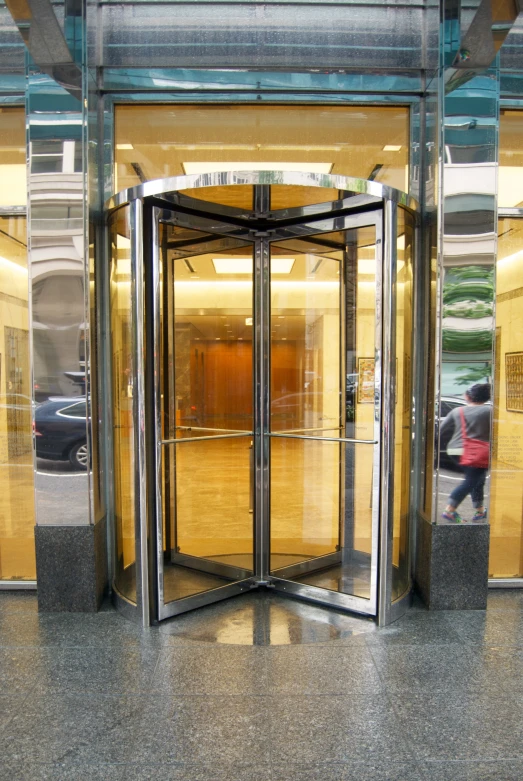 the entrance to an office building with glass doors