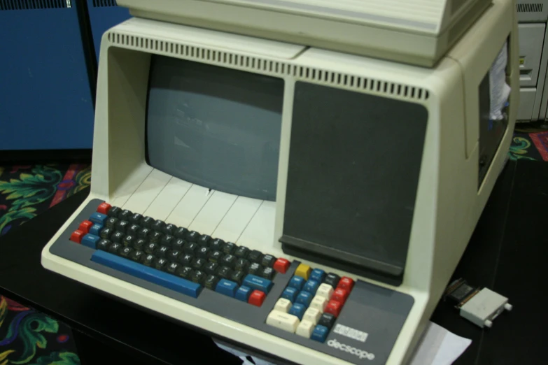 a computer with a keyboard and a monitor
