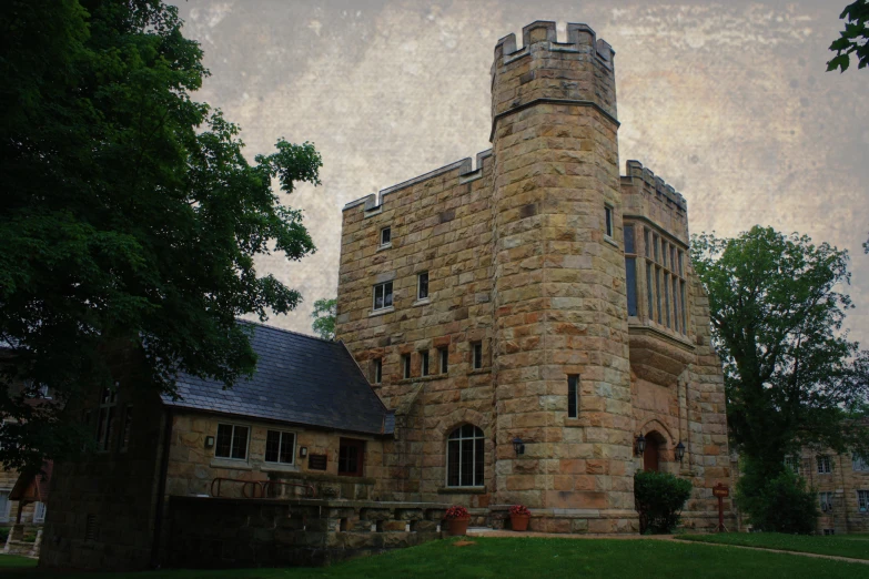 an old castle like building sits in a park