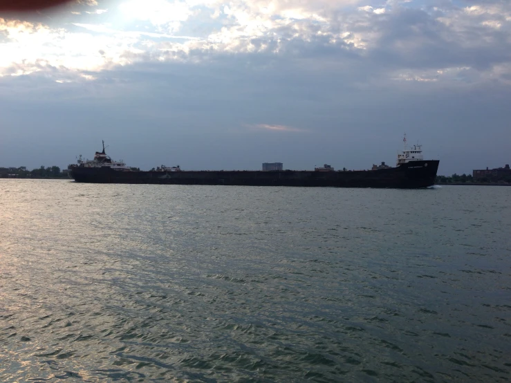 a large cargo ship sailing in the water