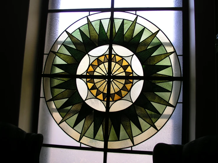 a close up of a large stained glass window