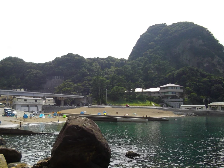 a view of the beach from a body of water