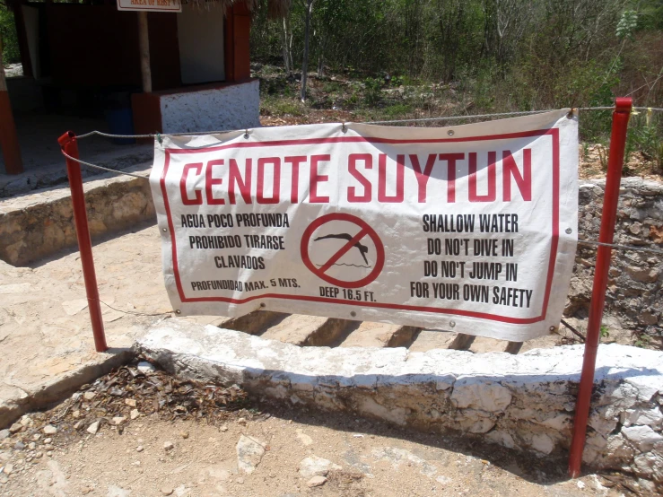 a sign warning people about genote syynn