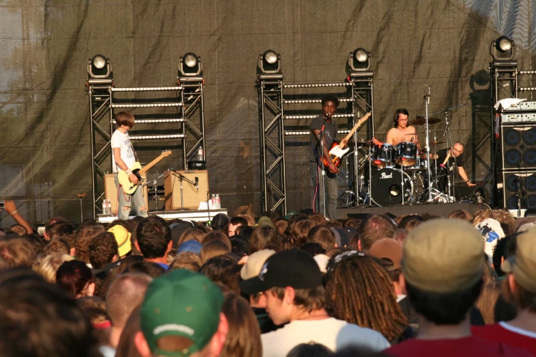 a group of people at an outdoor concert