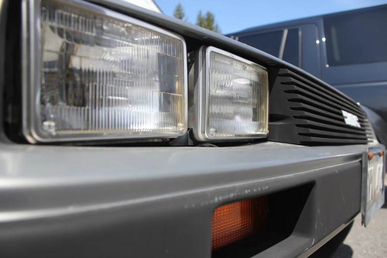 a close up of a close up of a car headlight