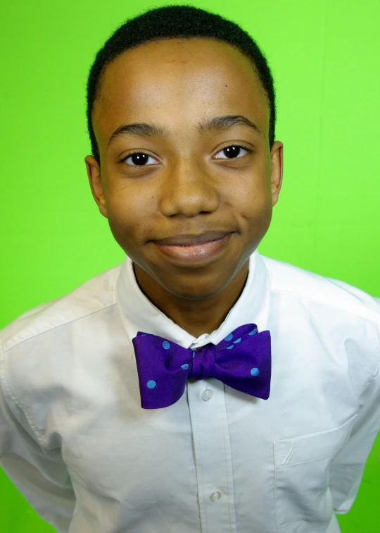 a  in a purple bow tie