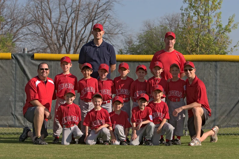 the baseball team has been posing for a team po