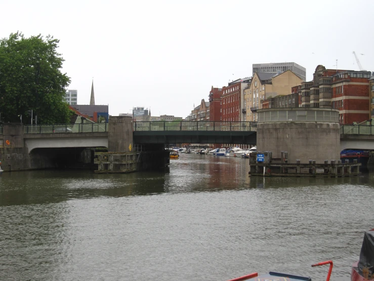 a bridge over a river in a city