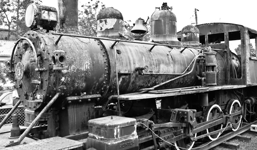 a close up of an old steam locomotive