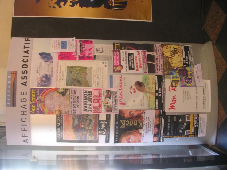 a newspaper cover sitting on a display table