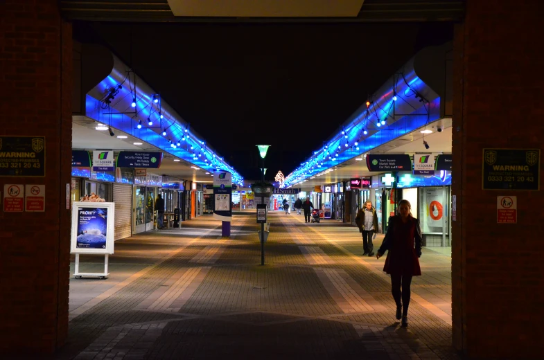 this is an illuminated walkway on the sidewalk