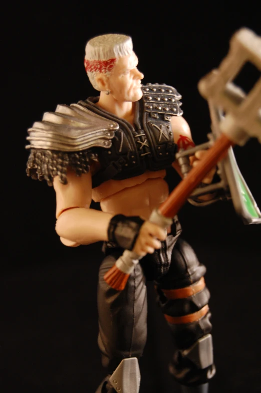 a small action figure with a big hammer and a huge axe