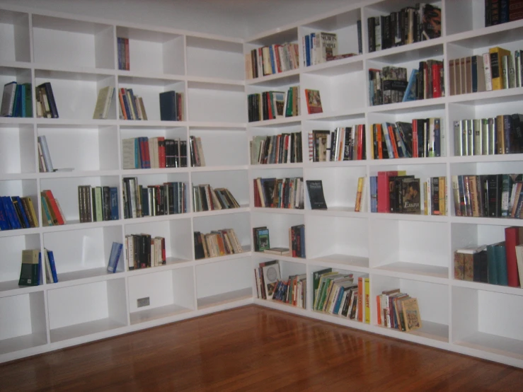 a large room filled with shelves filled with books