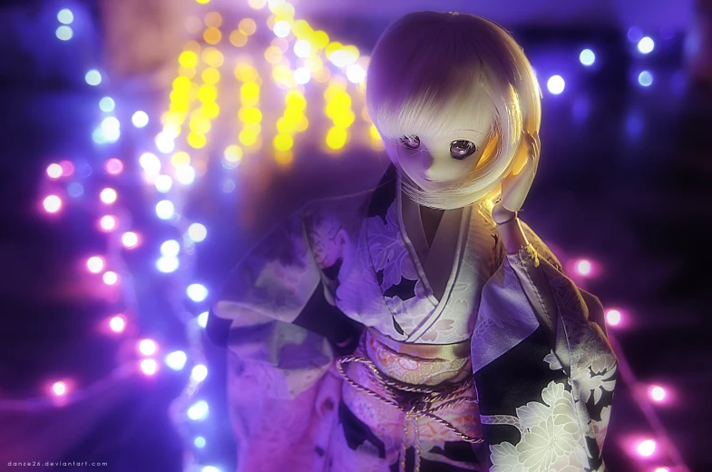 a doll wearing a japanese outfit with lights on the background