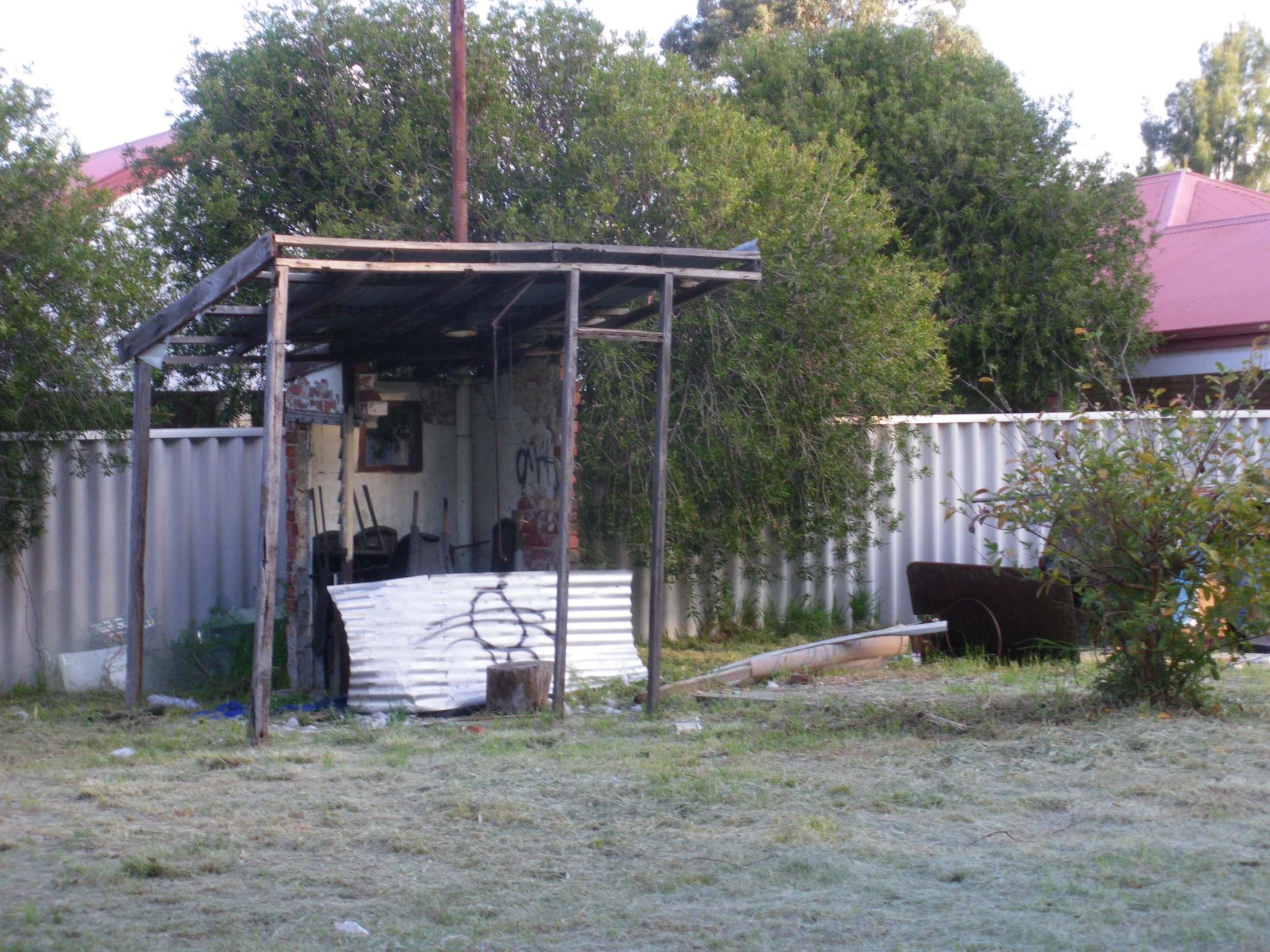 a house that has a bicycle leaning against it