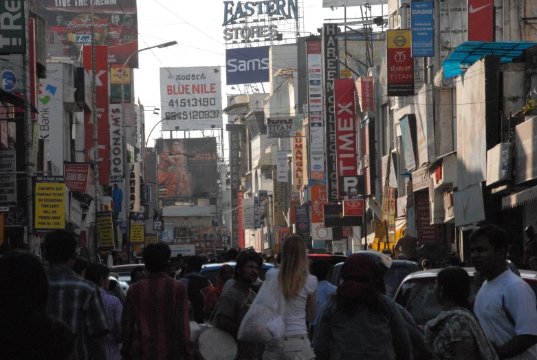 many people walk through the city center on the side