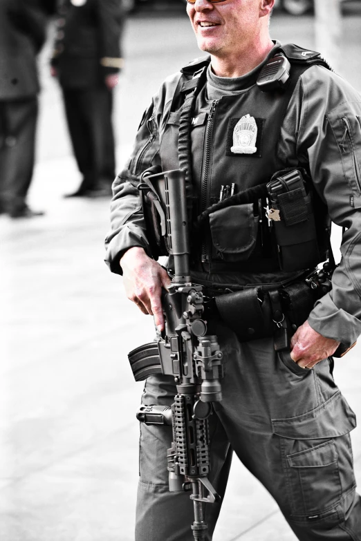 a soldier walking with his gun in hand