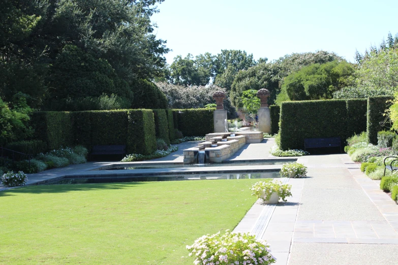 a park like area with trees and bushes around it