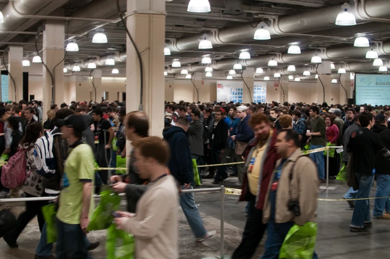 many people walk with bags of gifts as the line starts to take off