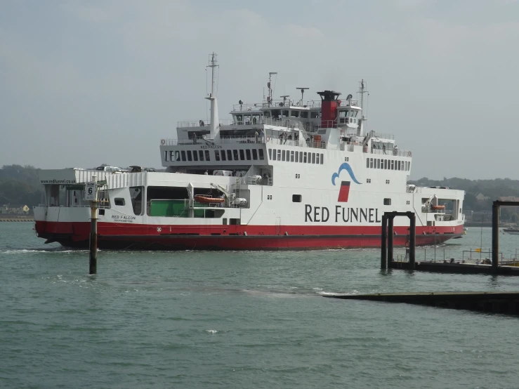 the boat is docked at the pier near a pier