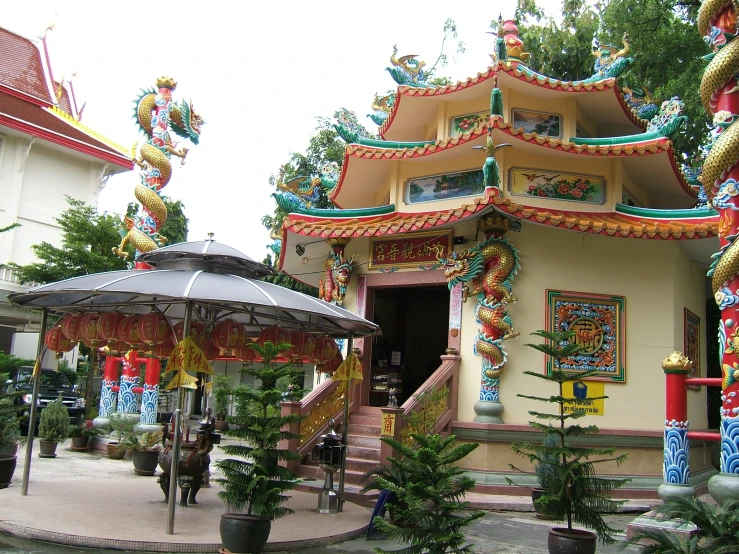 colorful buildings and a walkway with umbrellas