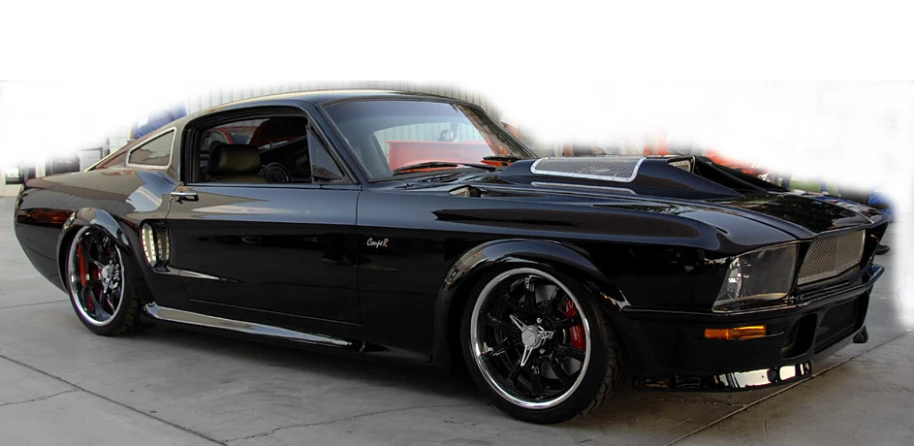 an all black mustang muscle car parked on the street