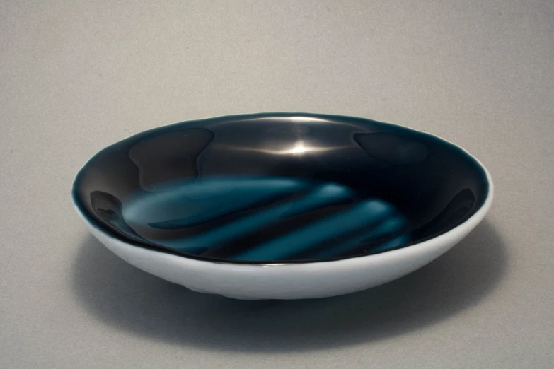 a bowl that has been turned into a modern sculpture