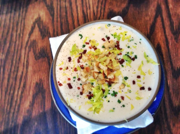 a small bowl of soup is sitting on the table