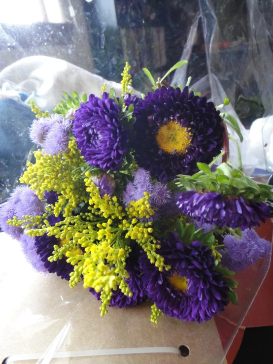 flowers are in a vase on top of a table