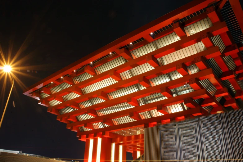 a large building with lights on it in the night