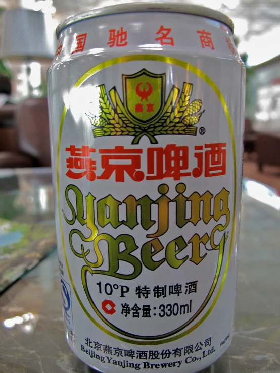 an asian type beer can on a table