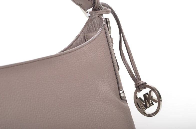 a handbag with a key and a ring around it