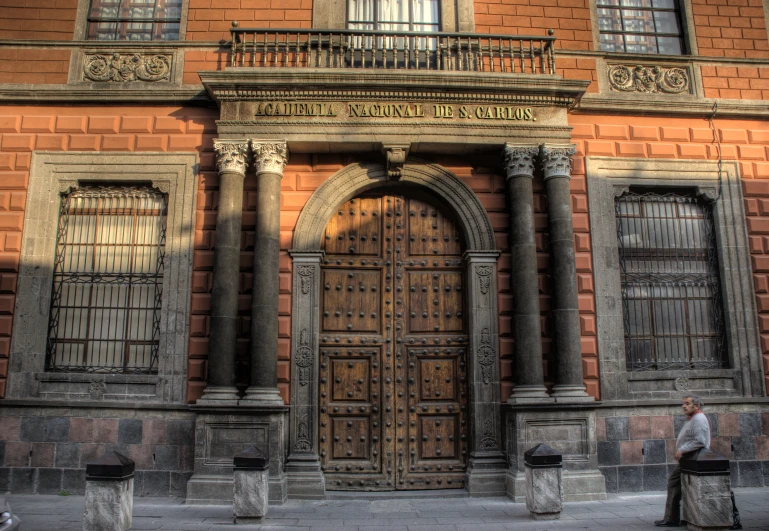 an old door with carvings on the outside