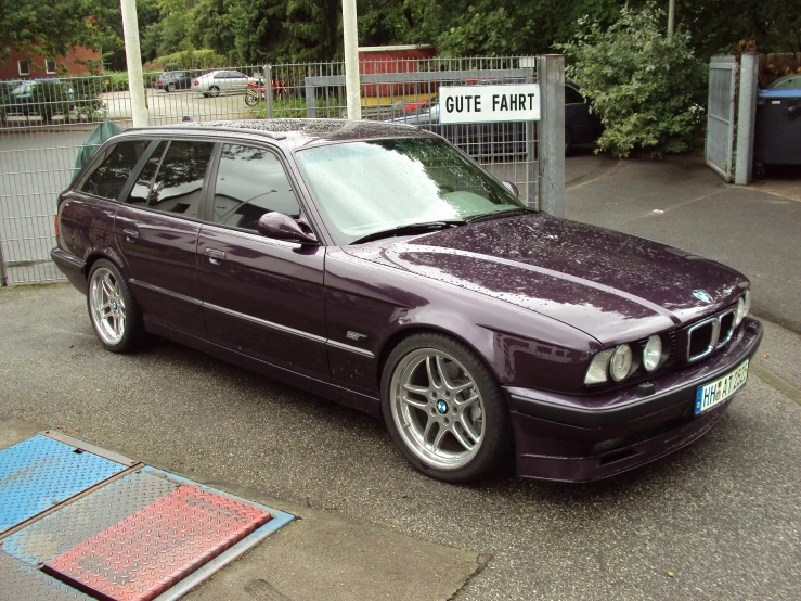 the car is parked on a paved area