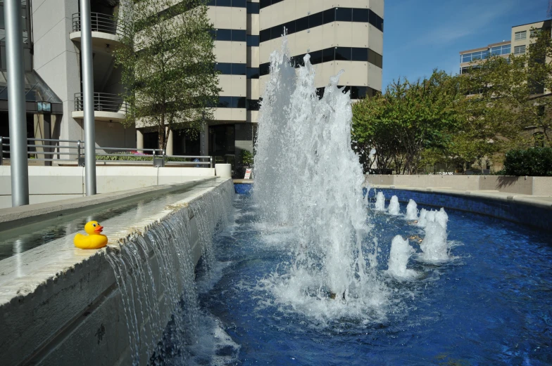 a fountain with water spouts coming out of it