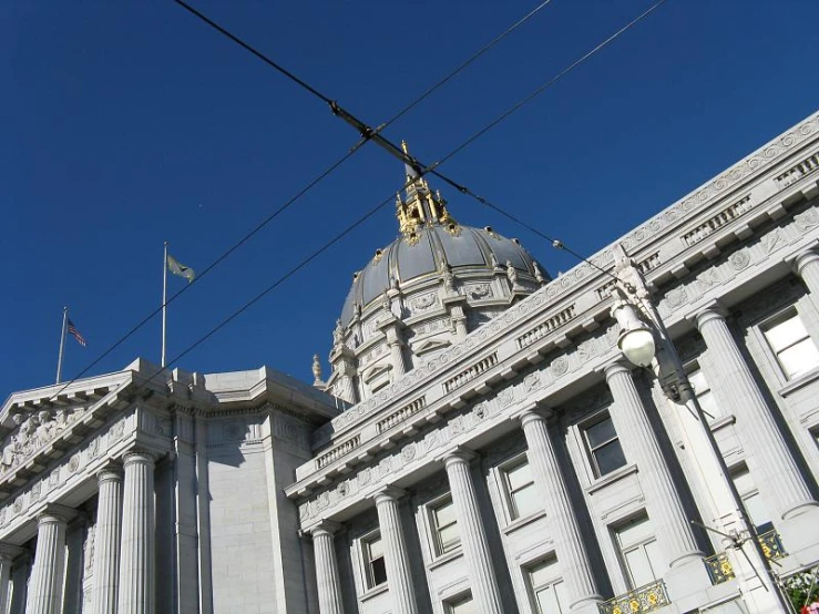 a view of an old building with a sky background