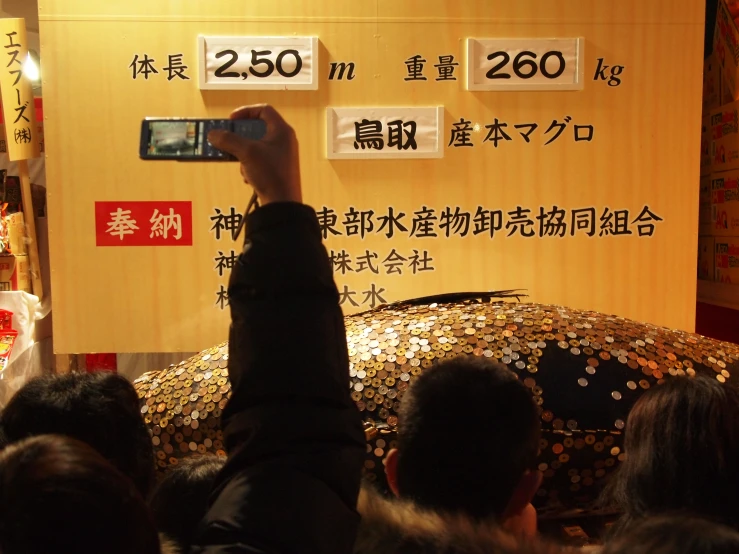 a crowd of people and an umbrella display