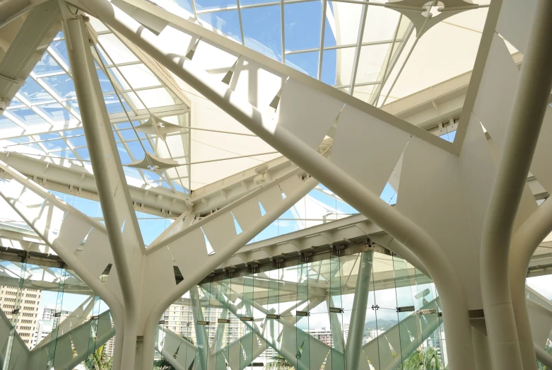 a view looking up at a very modern structure