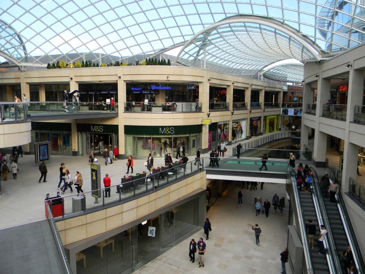 the interior of a building with a skylight above it