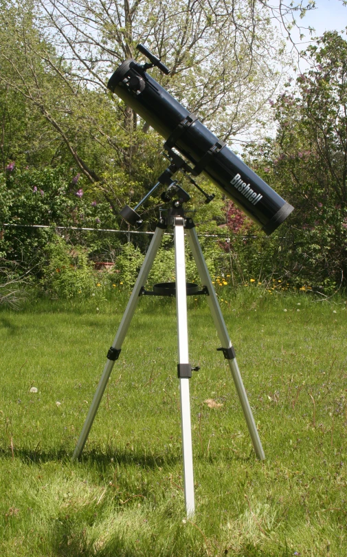 a telescope that is on top of a tripod