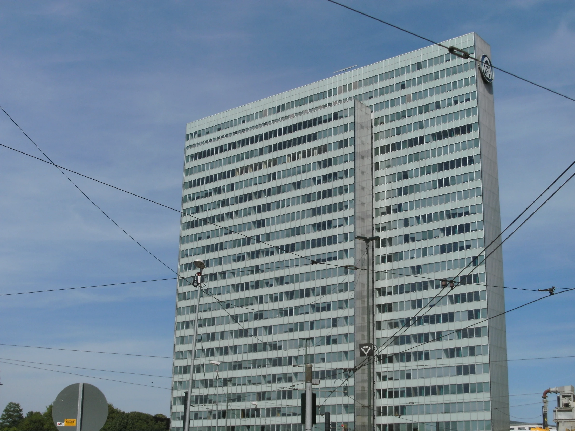 an image of a big office building that looks like it's been in an accident