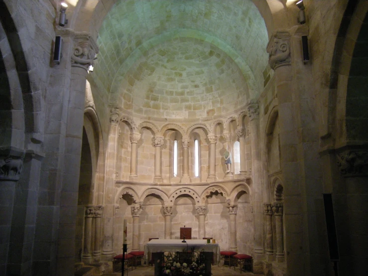 the large cathedral is decorated with pillars and arches