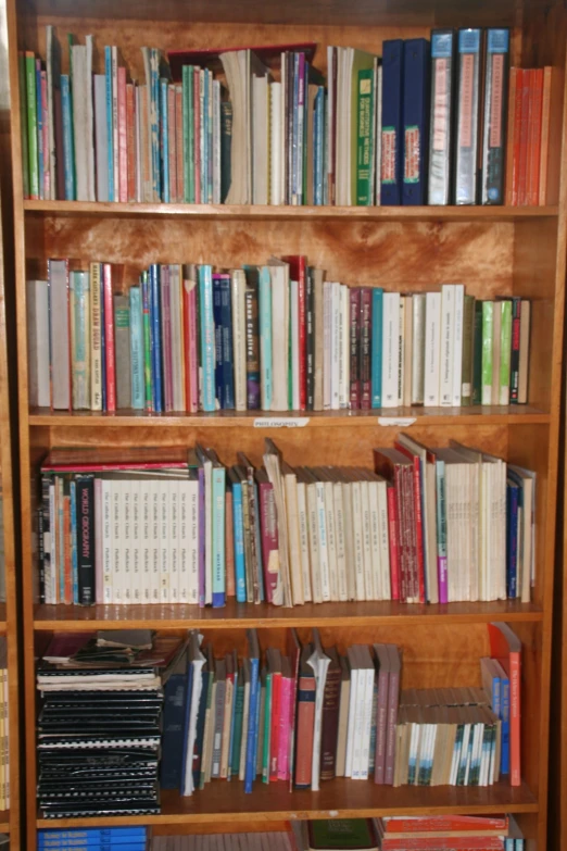 there is an empty book case full of books