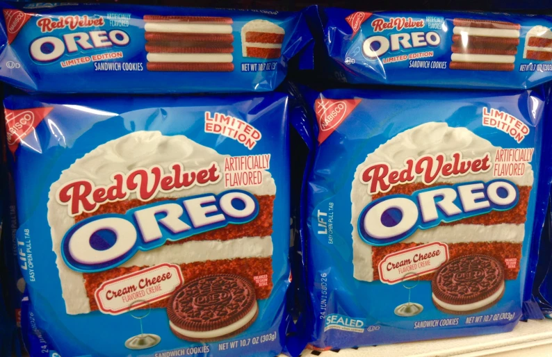 a couple of bags of oreo cookies are next to each other