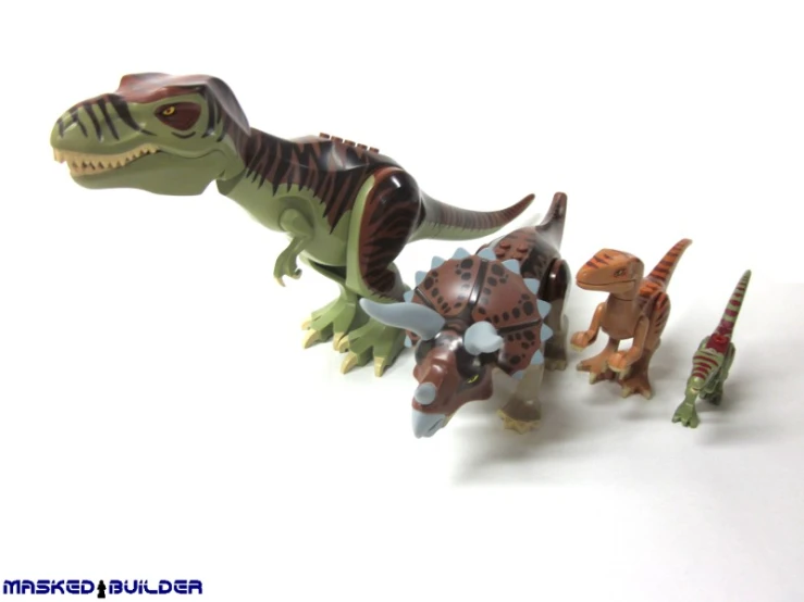 three toy dinosaurs with various colors and sizes