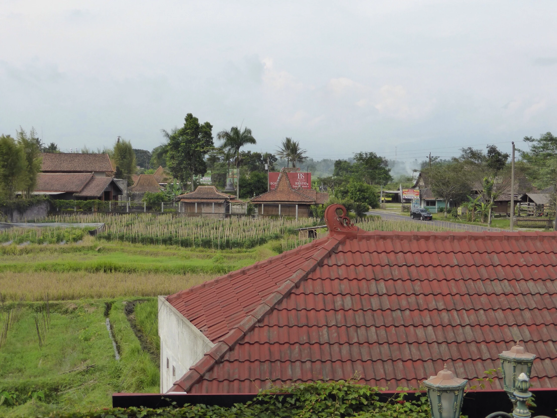 a small city with buildings and a field