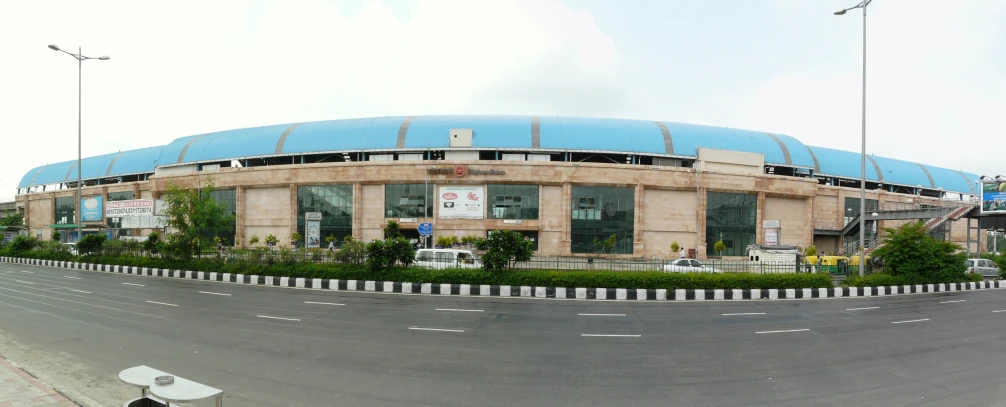 a round building on the side of a street