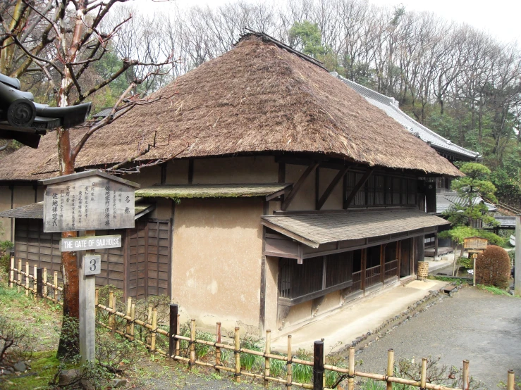 the exterior of a building is brown with a roof