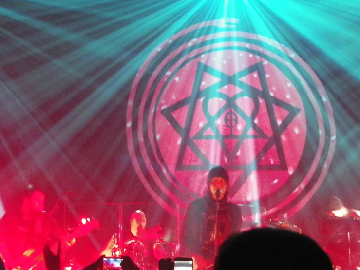 a stage with music and people looking at the stage